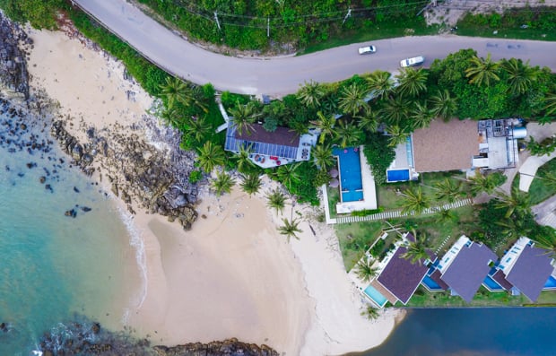 Aerial view of houses in nature.