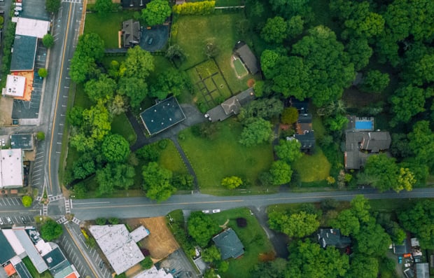 Aerial view of houses in nature.