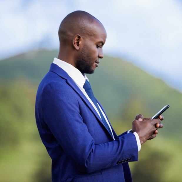 Individual looking at cellphone.