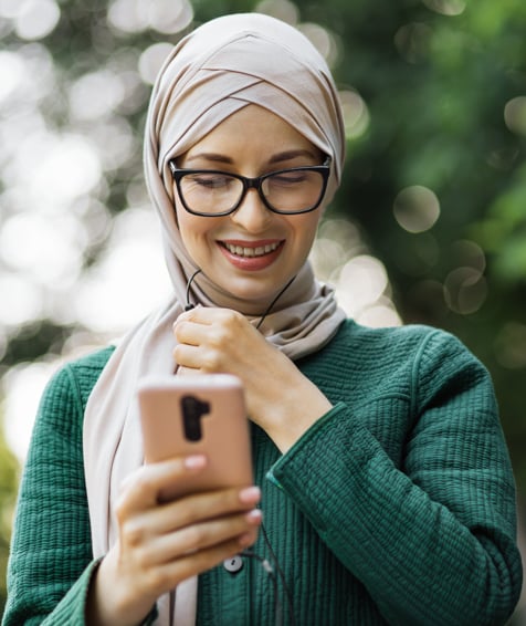 Individual looking at cellphone.