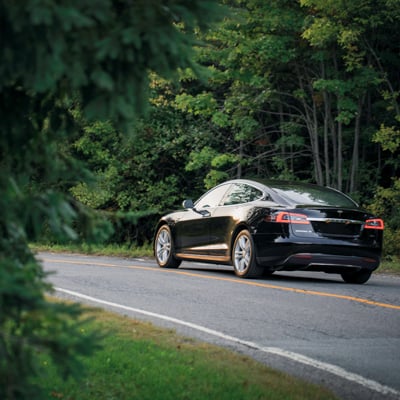 Car driving in nature.