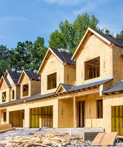 Unfinished houses being built.