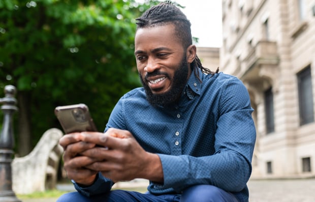 Individual looking at cellphone.